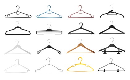 Image of Set with different empty hangers on white background