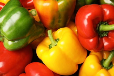 Photo of Colorful paprika peppers as background, closeup