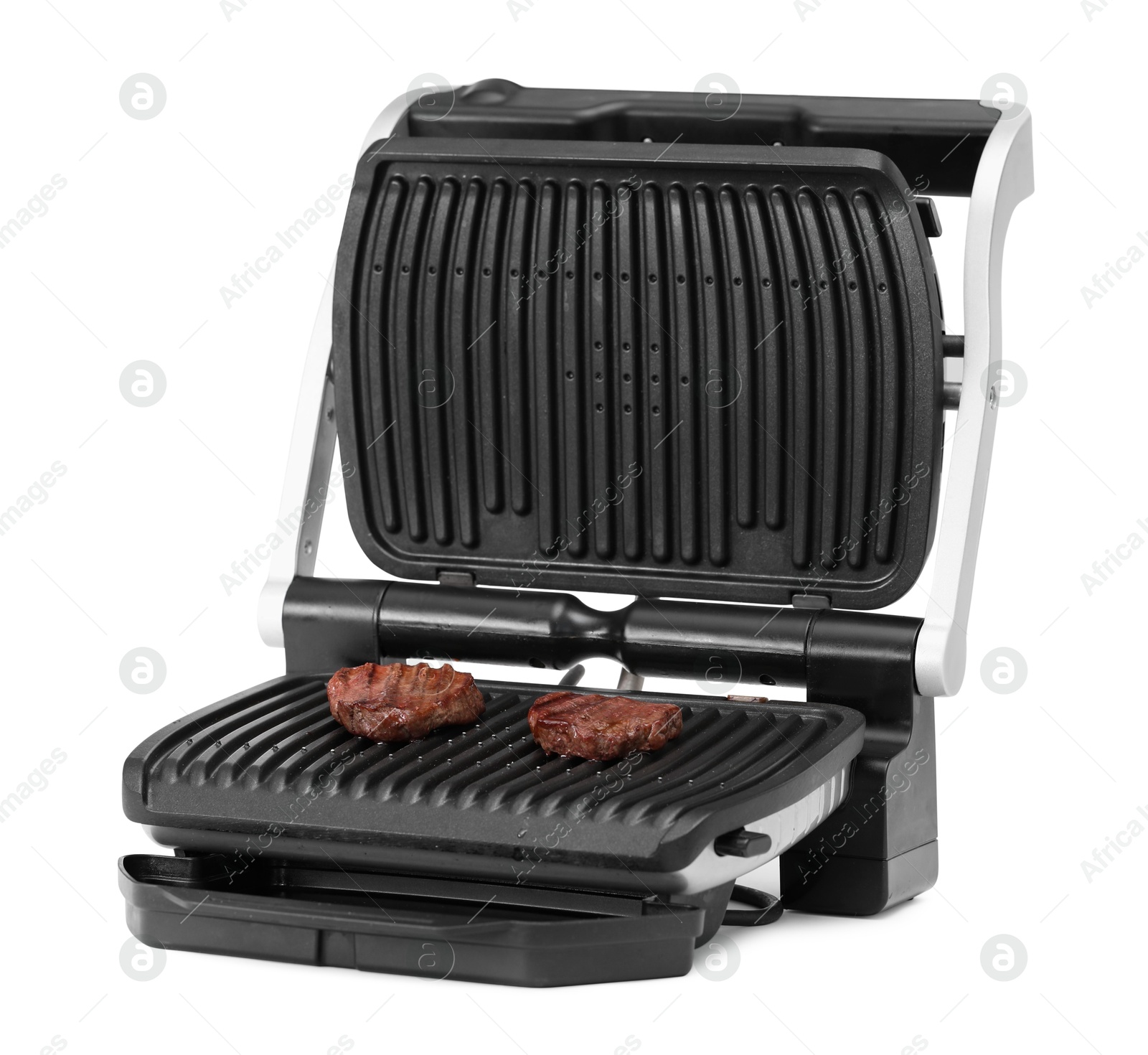 Photo of Electric grill with tasty meat steaks isolated on white