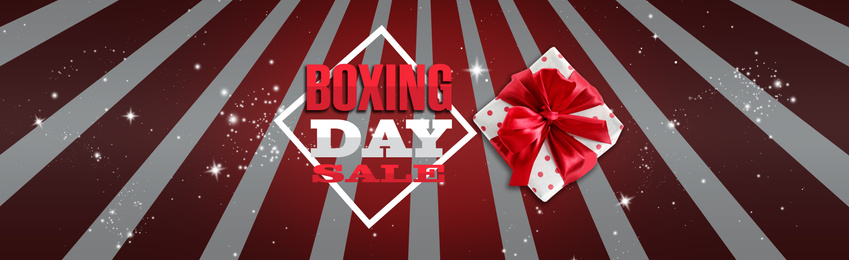 Image of Boxing day sale banner design. Gift on striped background