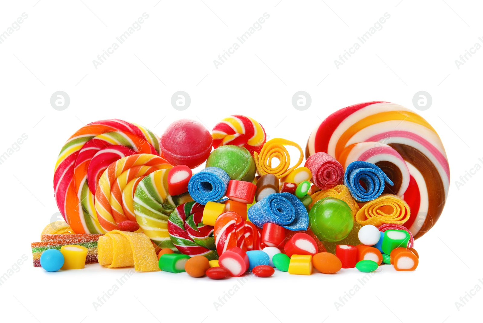 Photo of Many different yummy candies on white background