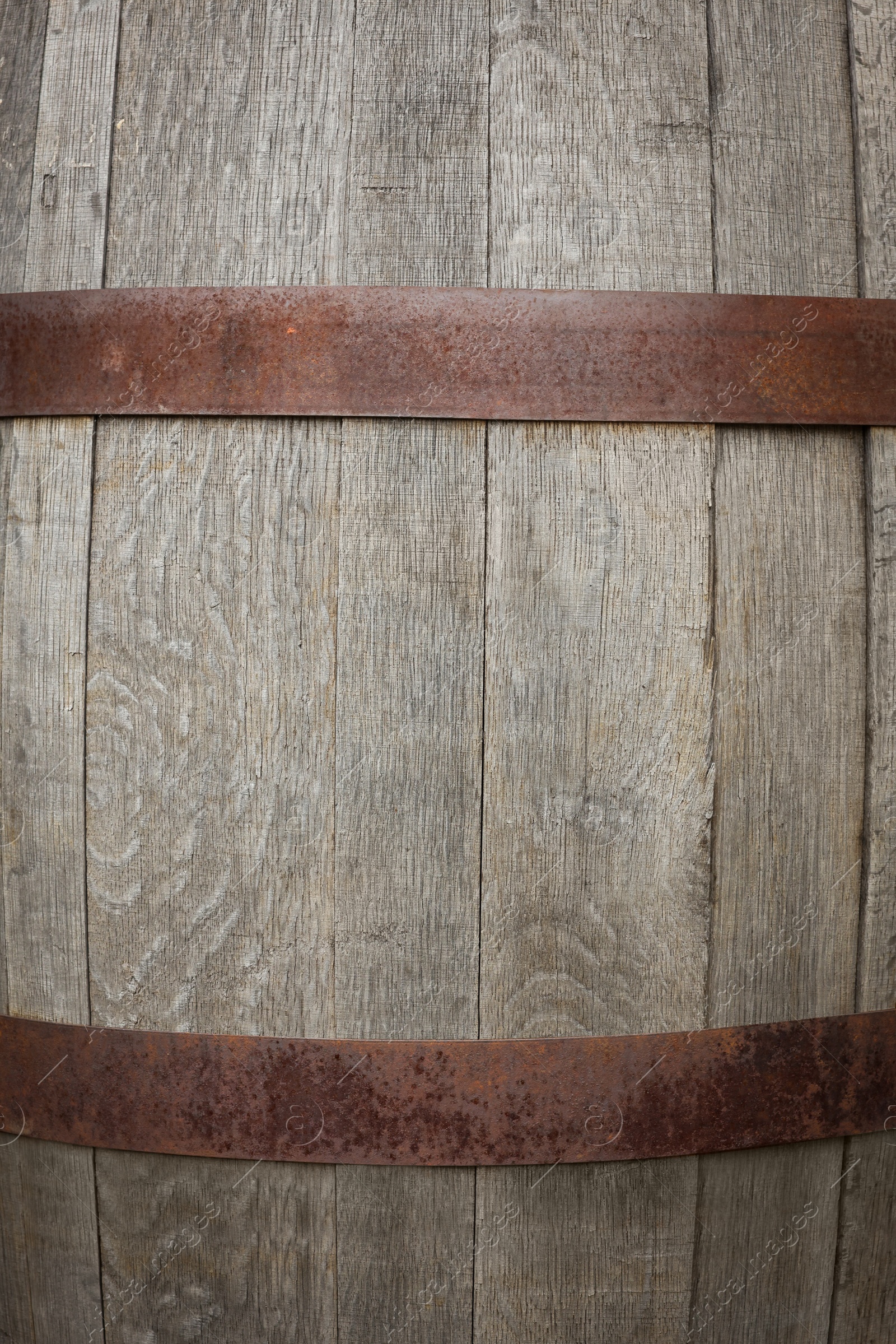 Photo of Traditional wooden barrel as background, closeup. Wine making