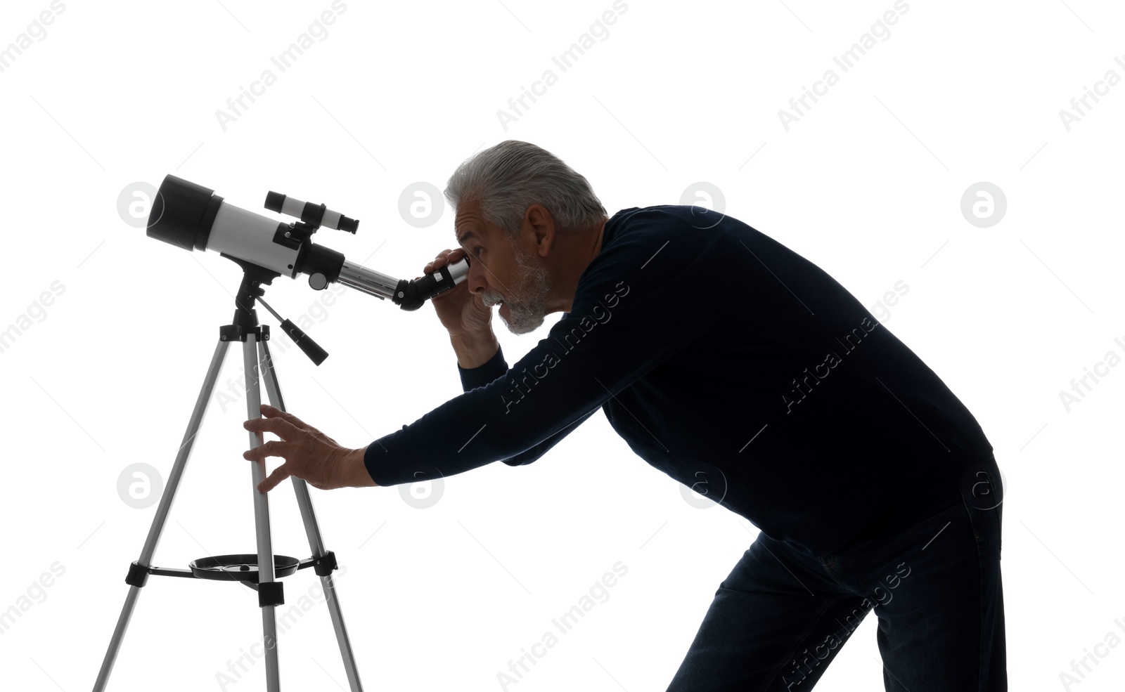 Photo of Senior astronomer looking at stars through telescope on white background