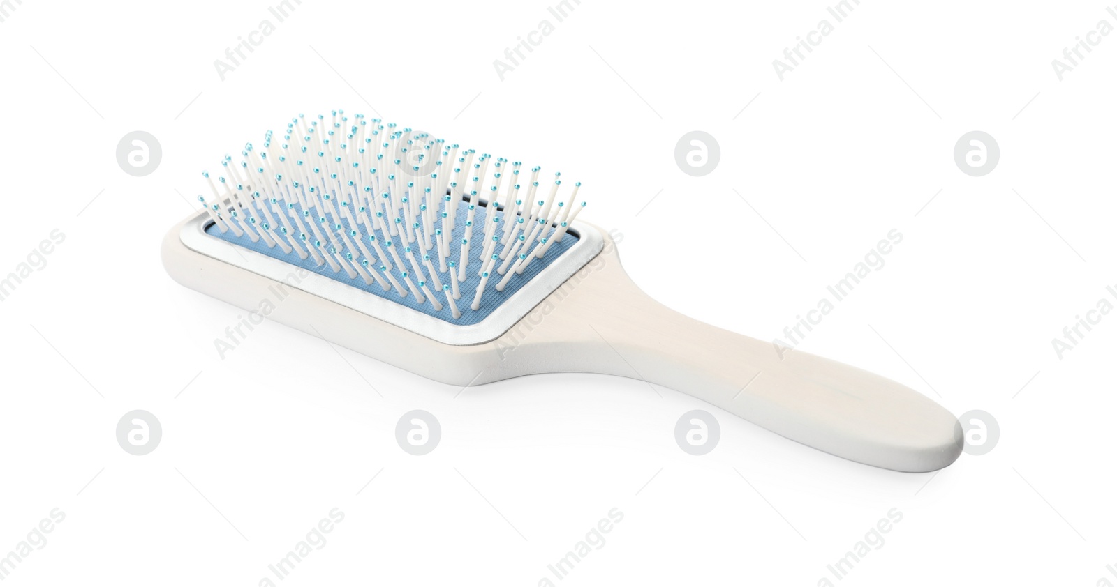 Photo of New modern hair brush isolated on white