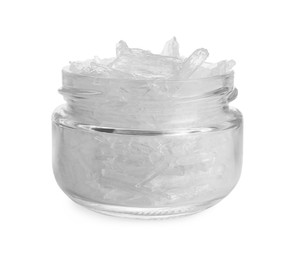 Photo of Menthol crystals in jar on white background