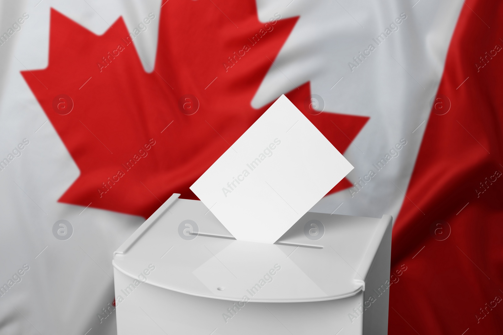 Image of Ballot box with vote against national flag of Canada