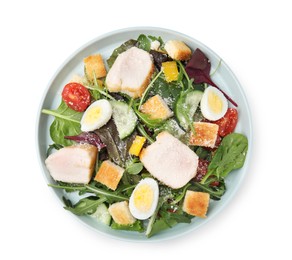 Photo of Delicious salad with croutons, chicken and eggs isolated on white, top view