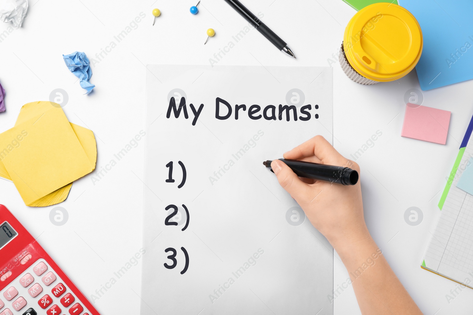 Image of Woman writing dreams at table, top view