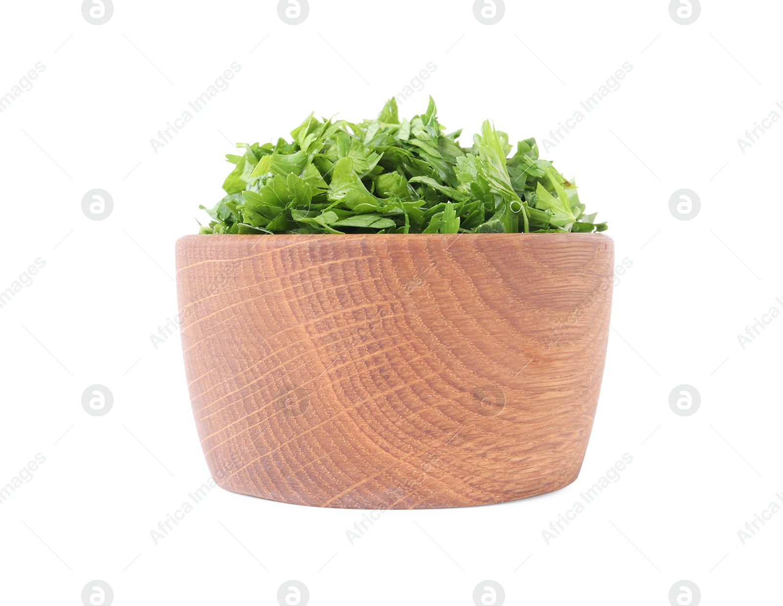 Chopped parsley leaves in wooden bowl isolated on white Photo of Chopped parsley leaves in wooden bowl isolated on white