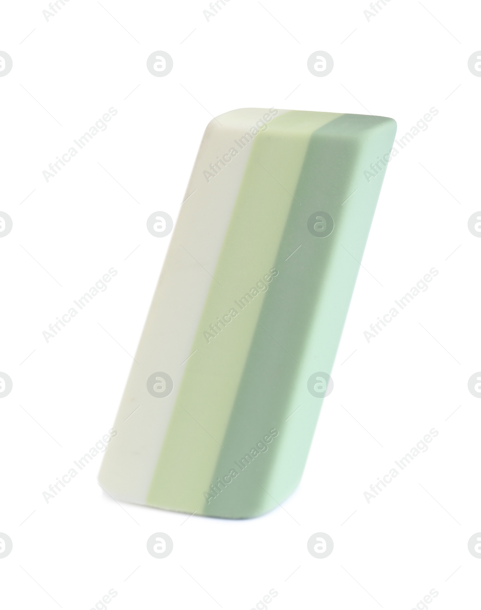 Photo of New bright eraser isolated on white. School stationery