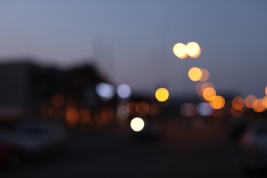 Photo of Blurred view of beautiful city in evening