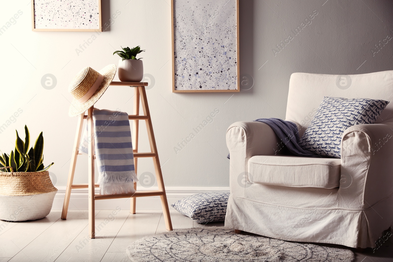 Photo of Beautiful room interior with stylish wooden ladder