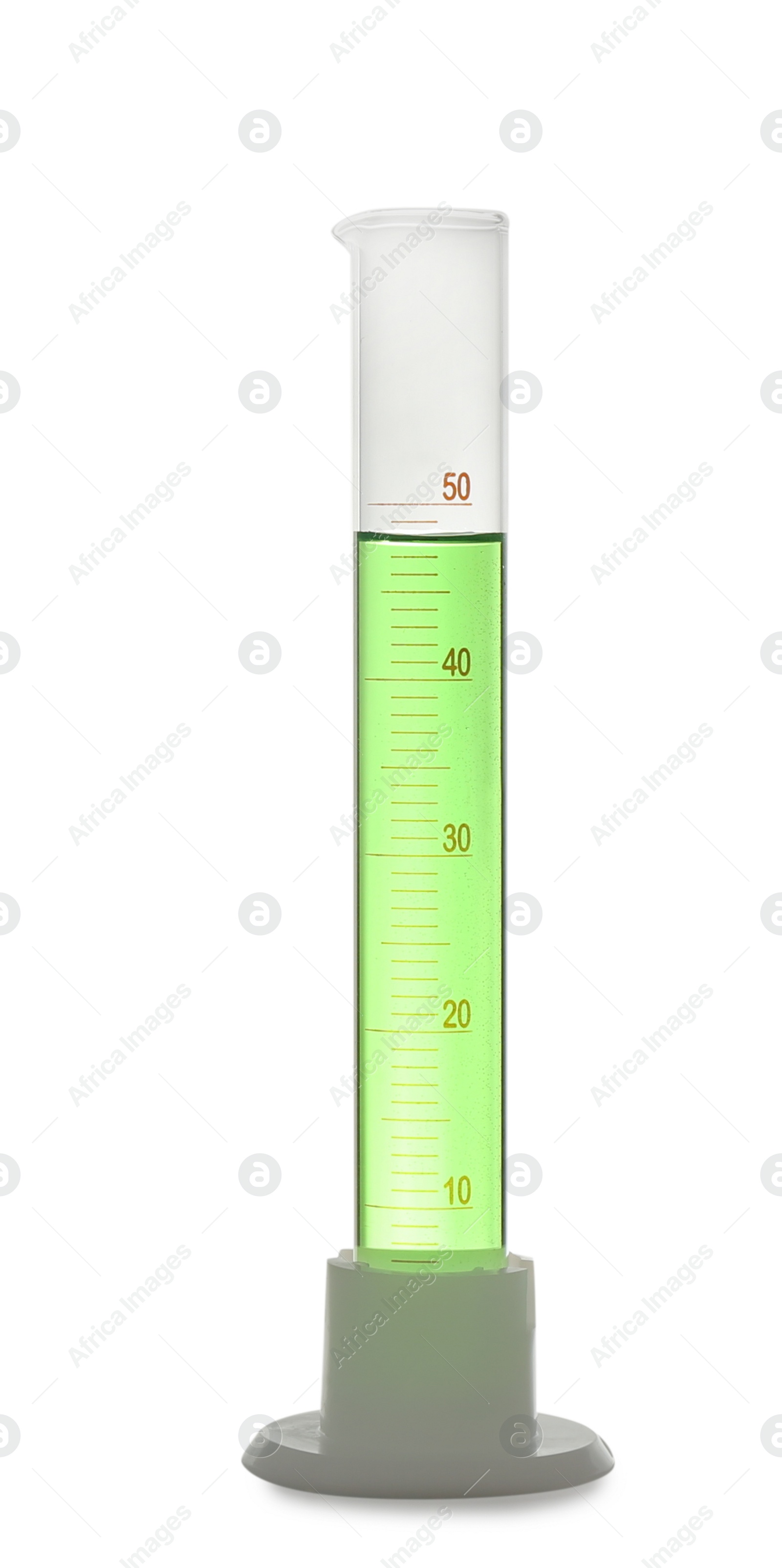 Photo of Graduated cylinder with light green liquid isolated on white