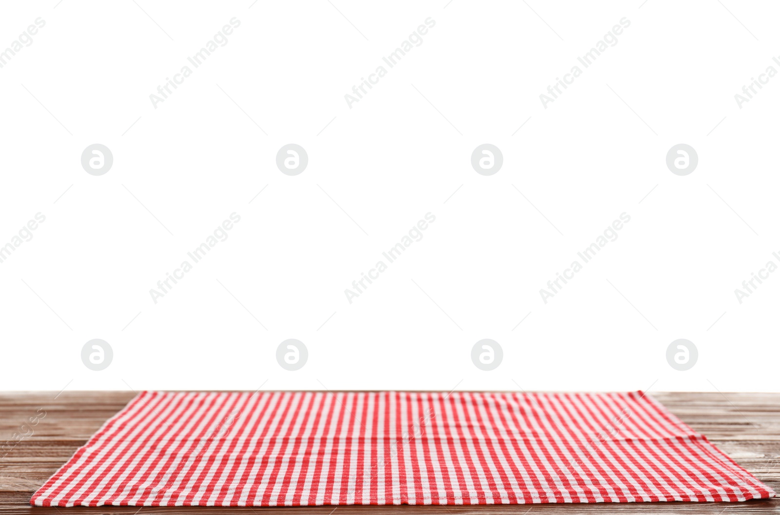 Photo of Checkered napkin on table against white background