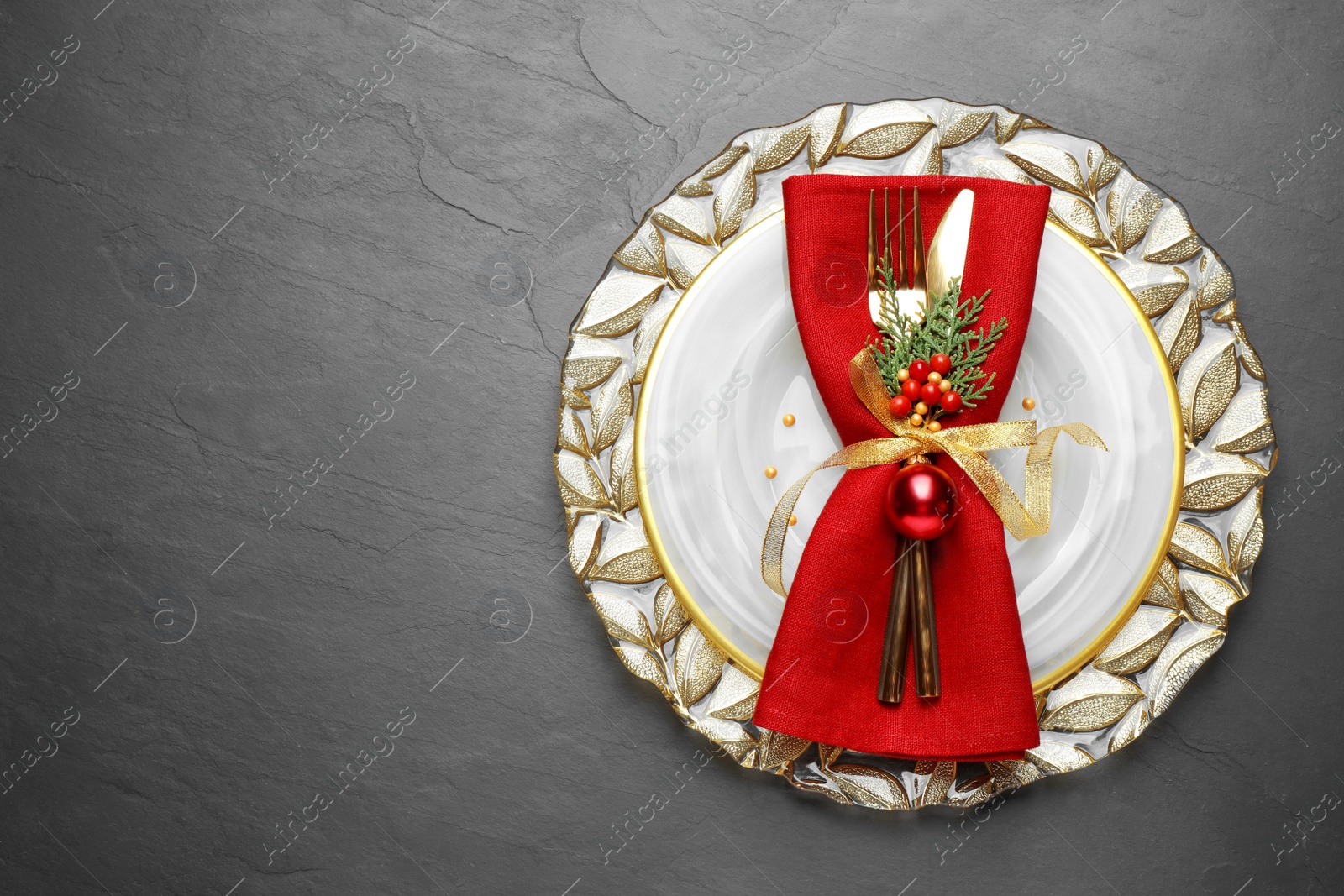 Photo of Beautiful Christmas table setting on grey background, top view. Space for text