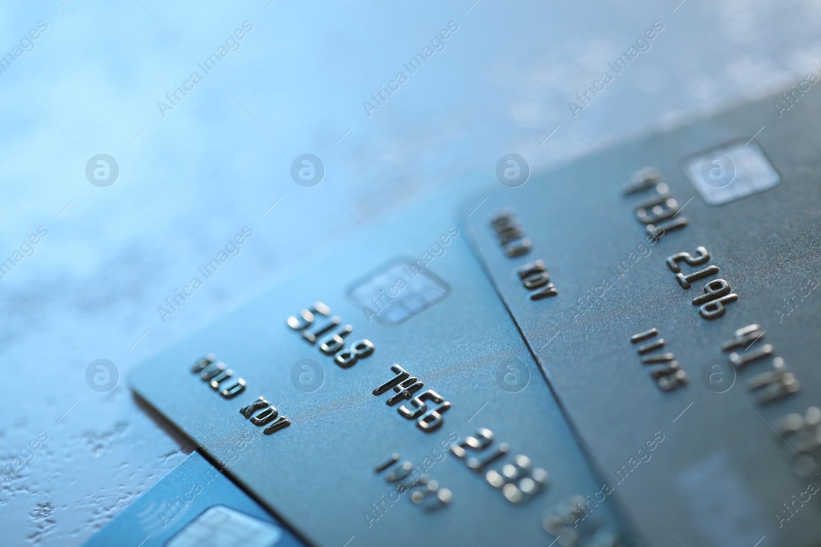 Photo of Plastic credit cards on table, closeup view