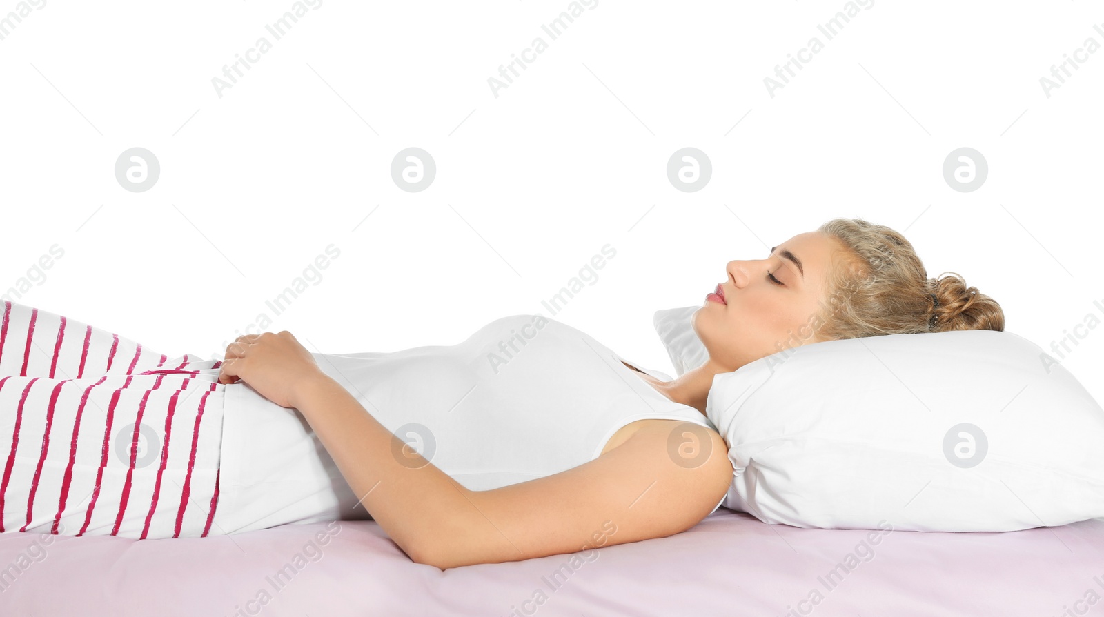 Photo of Beautiful woman sleeping with comfortable pillow on bed against white background