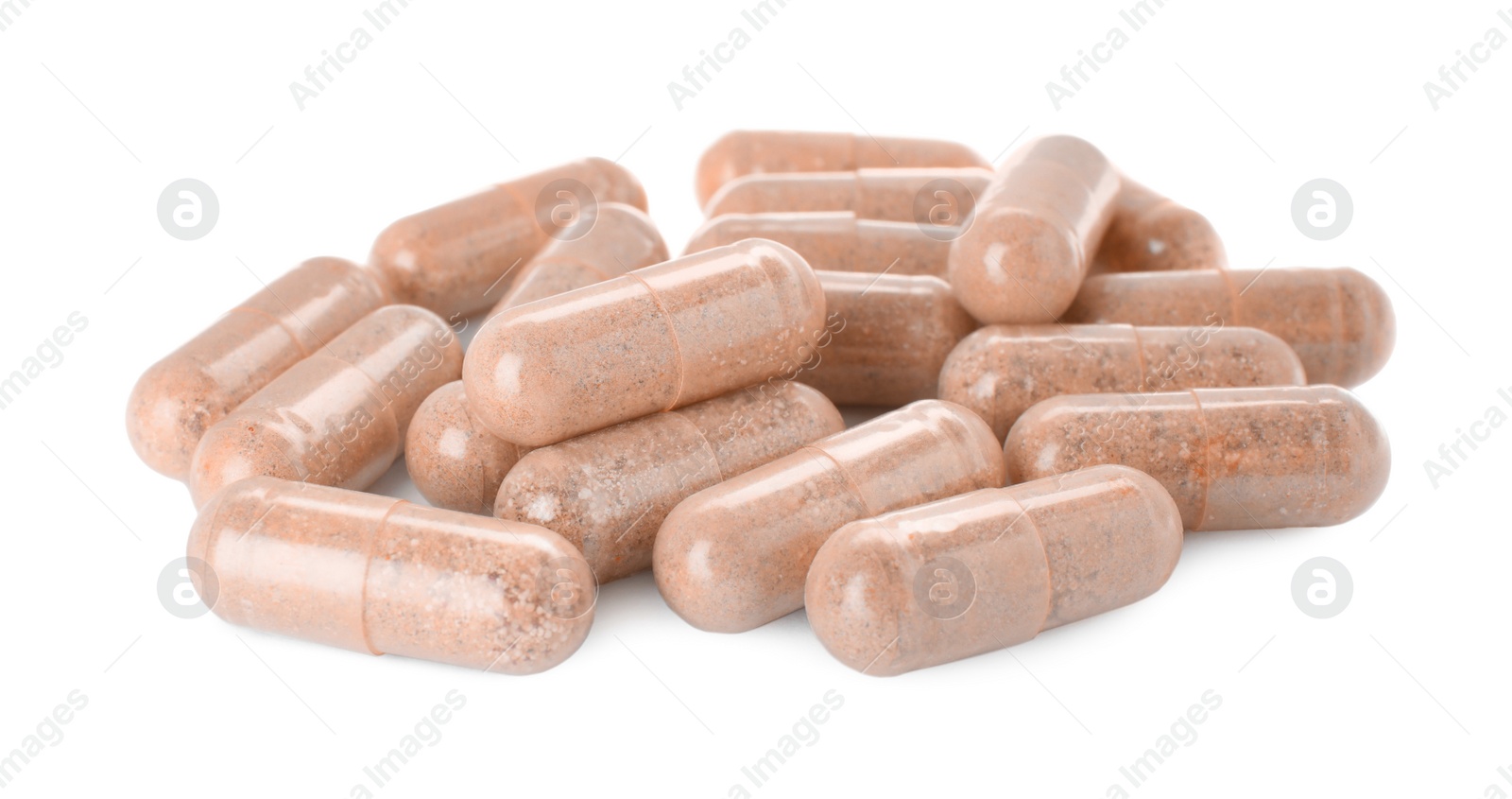 Photo of Many transparent gelatin capsules on white background