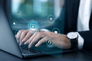 Image of Webinar. Man using laptop at table, closeup. Virtual screen with icons over computer