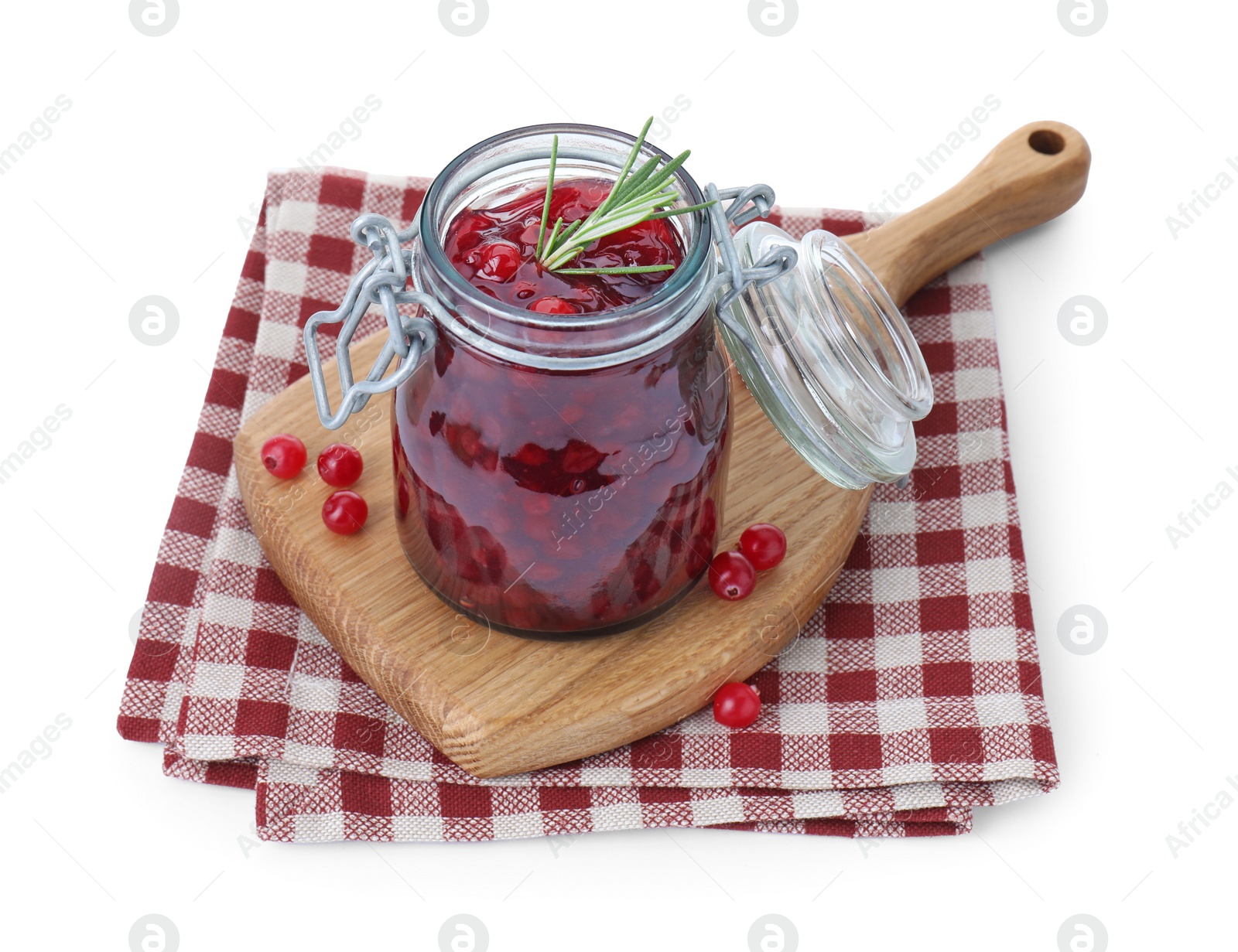 Photo of Fresh cranberry sauce in glass jar isolated on white