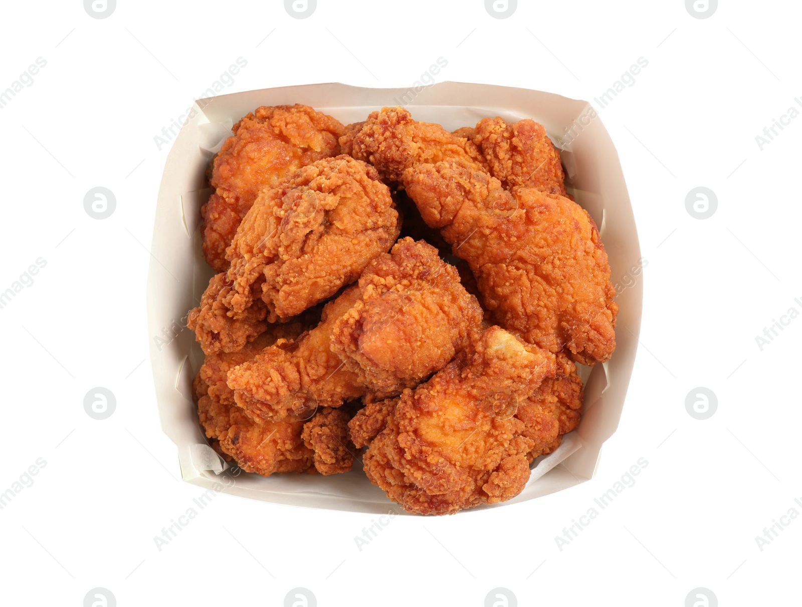 Photo of Tasty deep fried chicken pieces isolated on white, top view