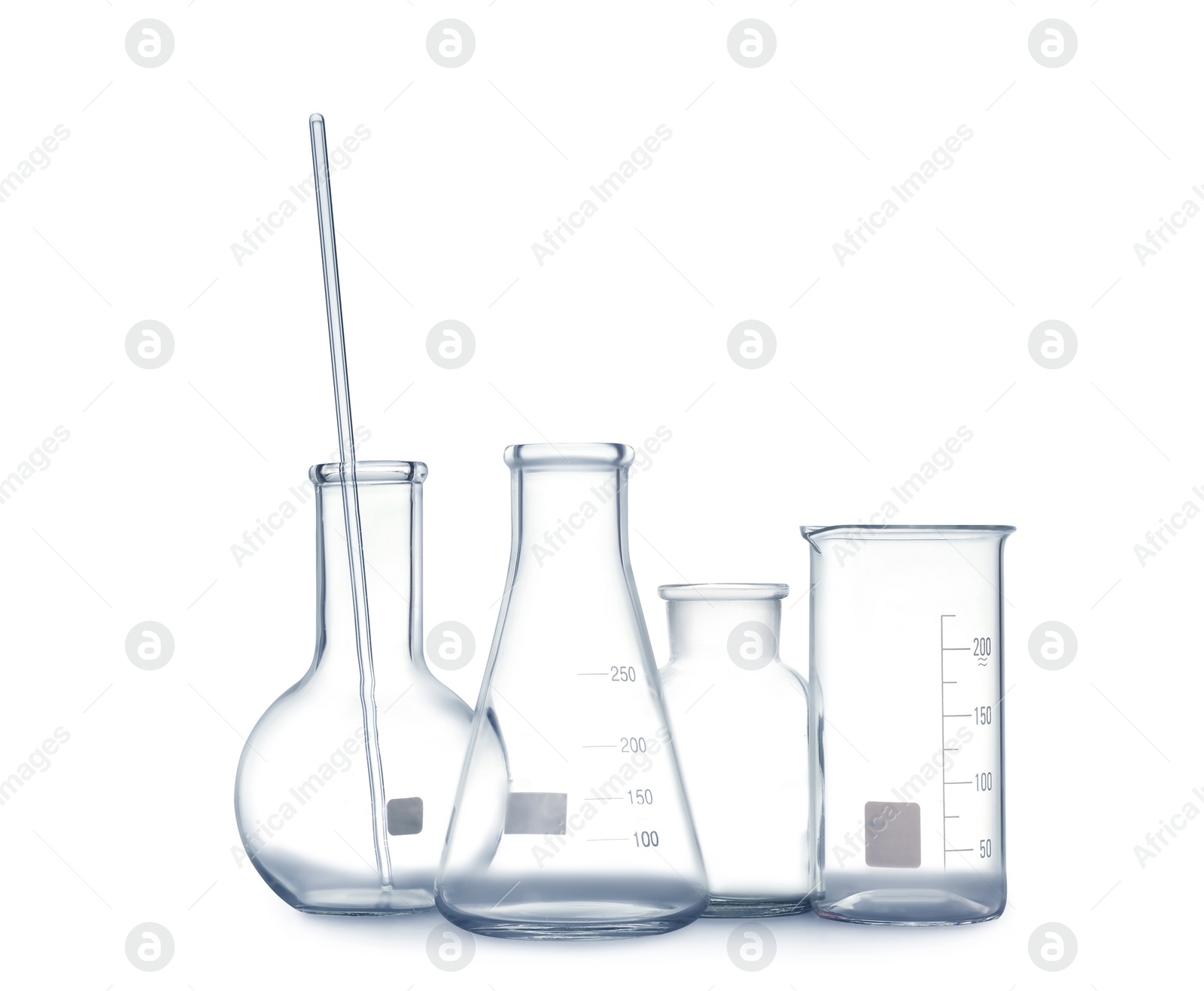 Photo of Empty clean laboratory glassware on white background