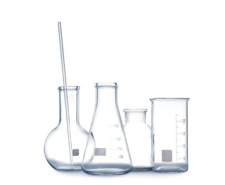 Photo of Empty clean laboratory glassware on white background