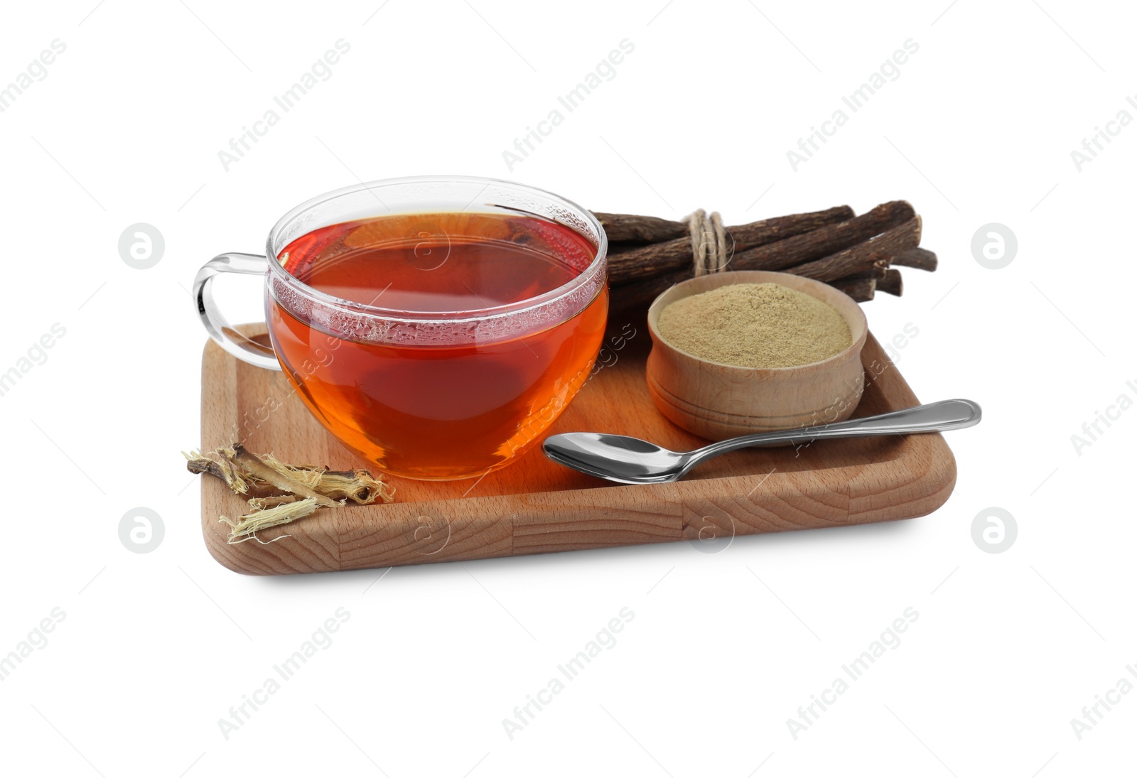 Photo of Aromatic licorice tea in cup, dried sticks of licorice root, powder and spoon on white background