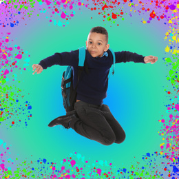 Image of African-American boy jumping on colorful background. School holidays
