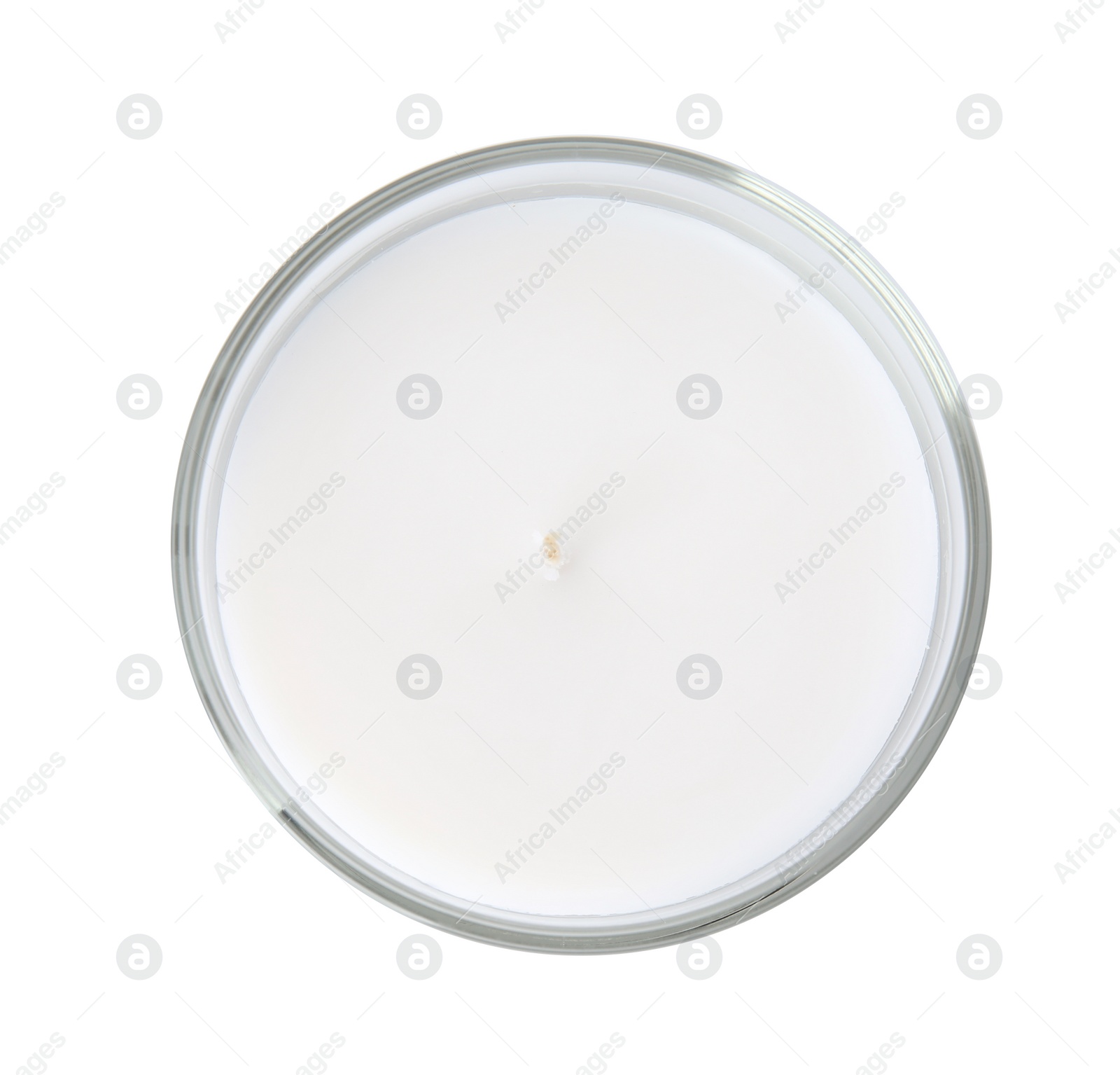 Photo of Candle in glass holder on white background, top view