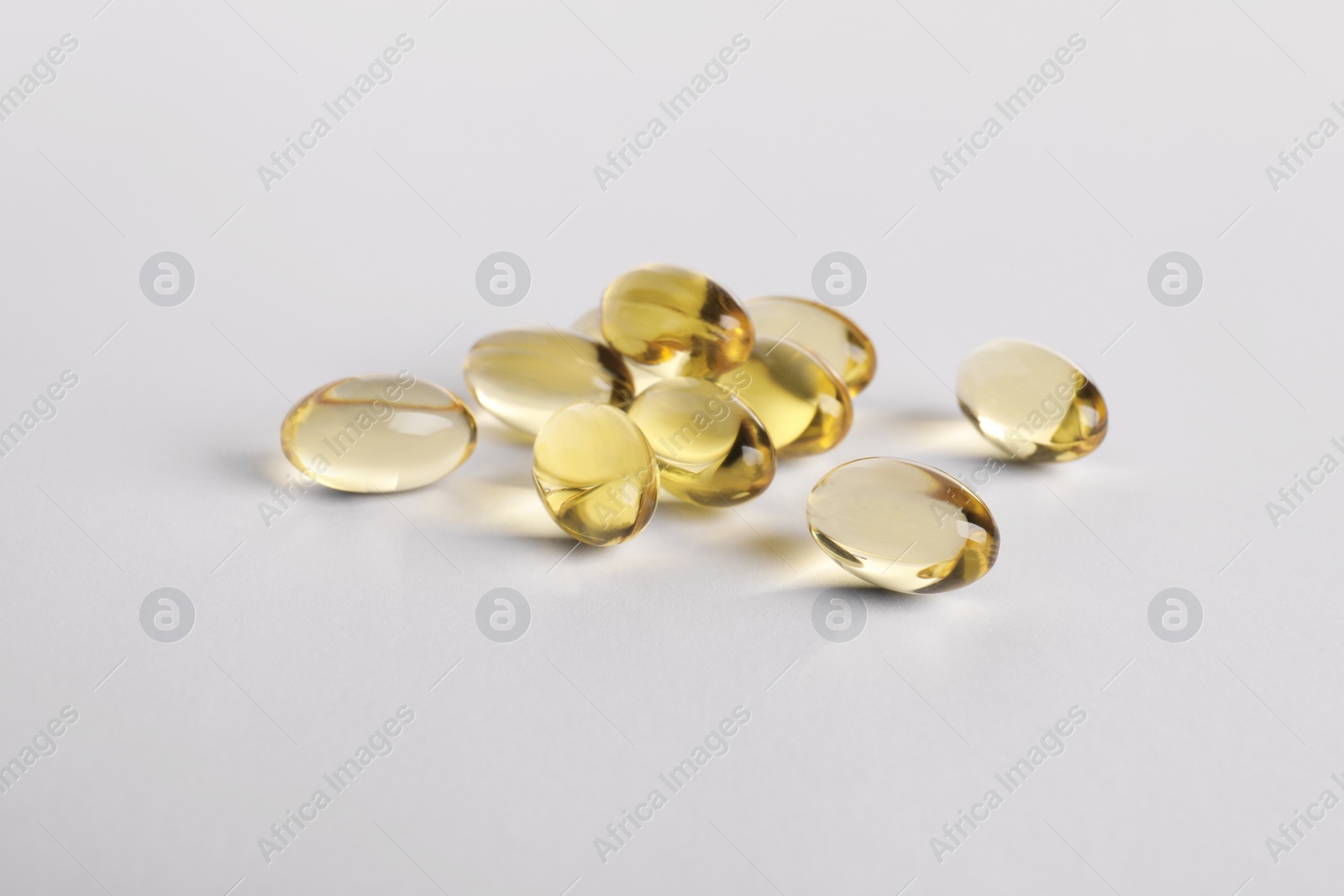 Photo of Many pills on white background. Medicinal treatment