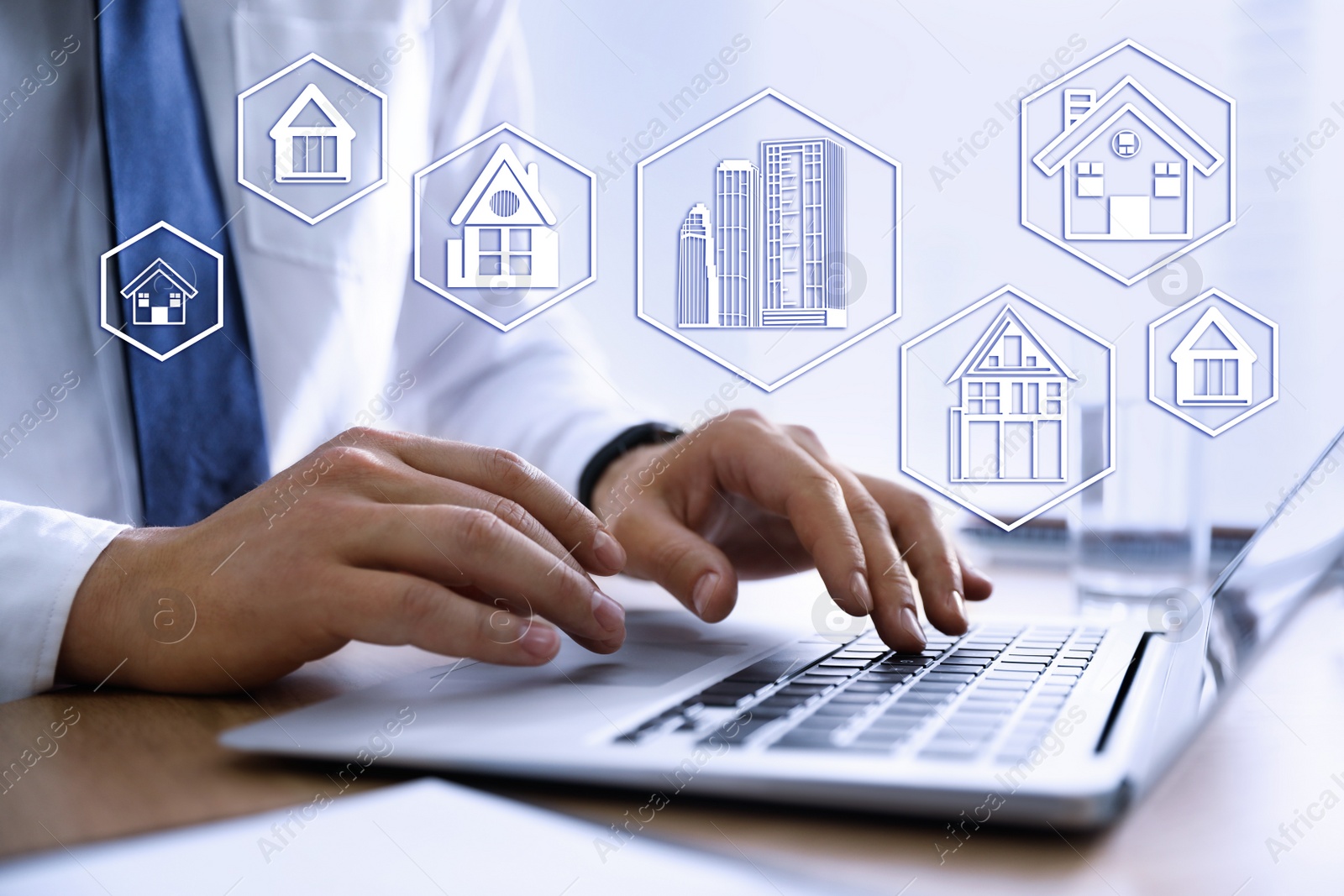 Image of Property search concept. Man using laptop at table, closeup