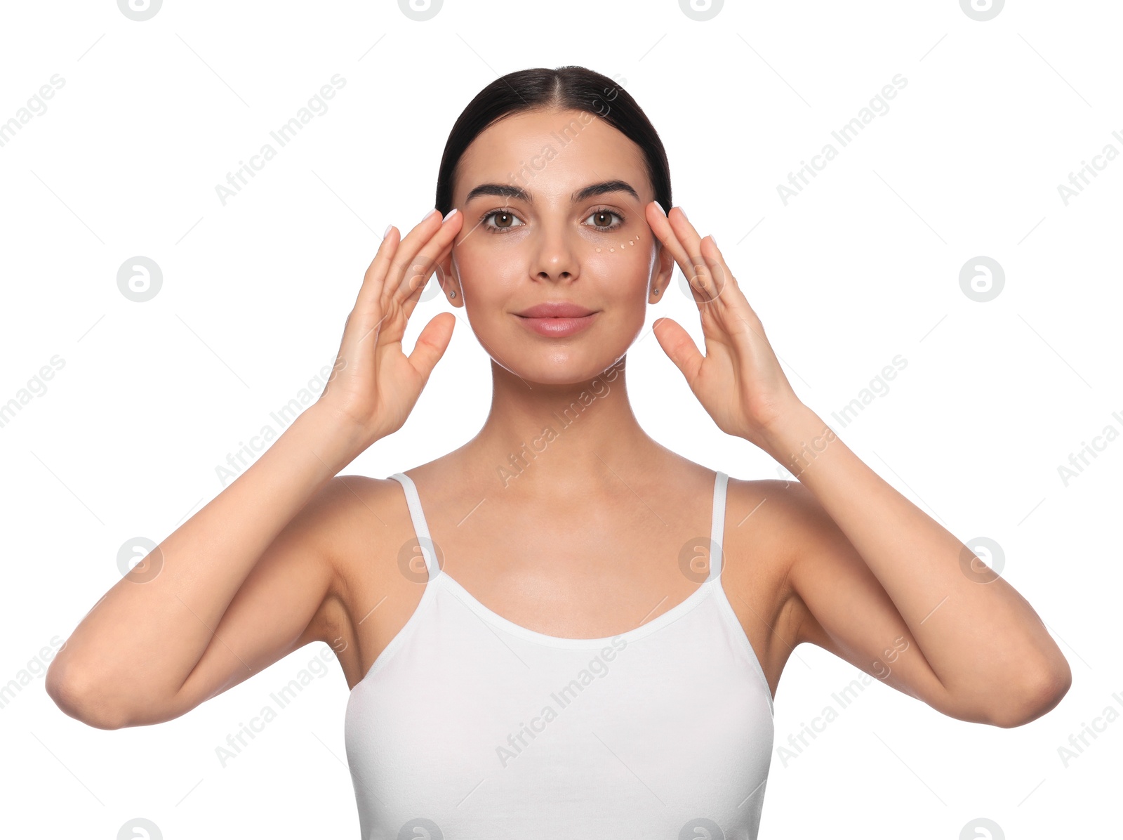 Photo of Beautiful young woman with gel on skin under eye against white background