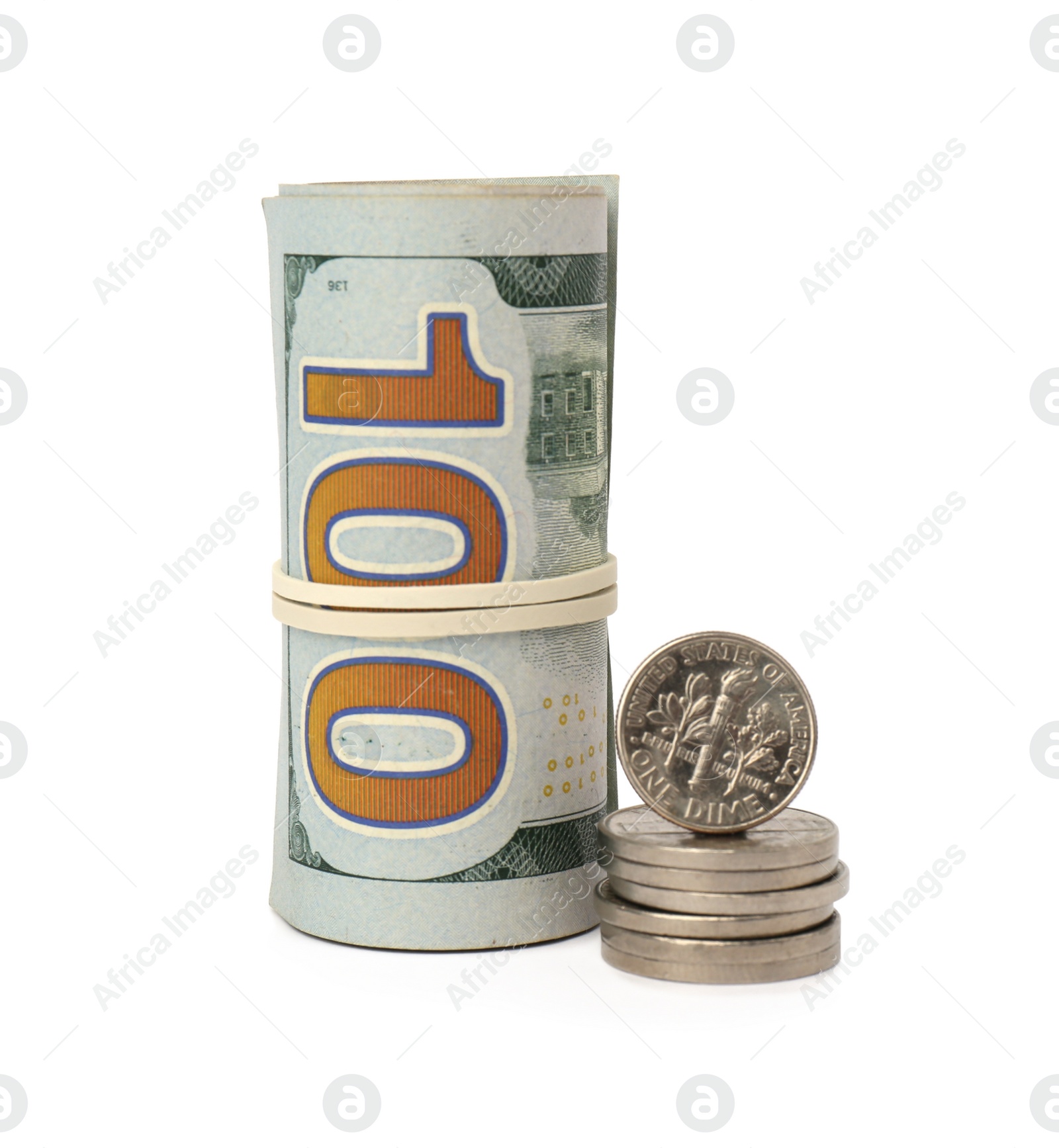 Photo of Rolled dollar banknotes and stack of coins on white background