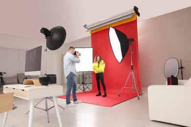 Beautiful African American model posing for professional photographer in studio