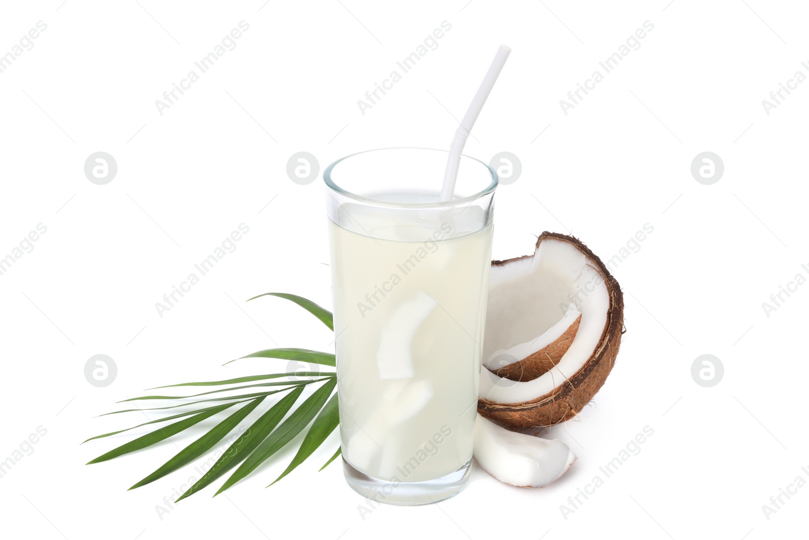 Photo of Glass of coconut water, leaf and nut isolated on white