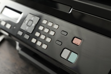 Photo of Closeup view of new modern printer on table