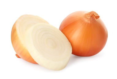 Whole and cut onions on white background