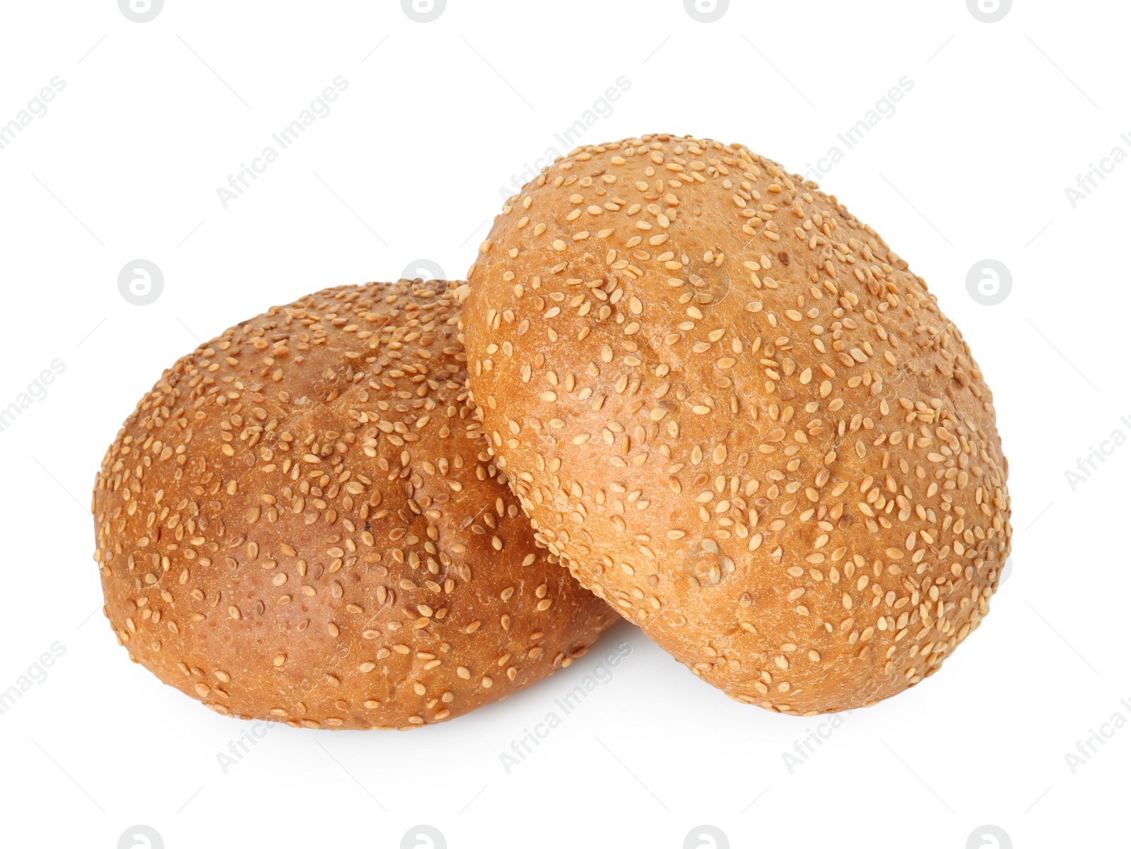 Photo of Two fresh hamburger buns with sesame seeds isolated on white