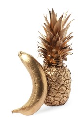 Photo of Shiny golden pineapple and banana on white background
