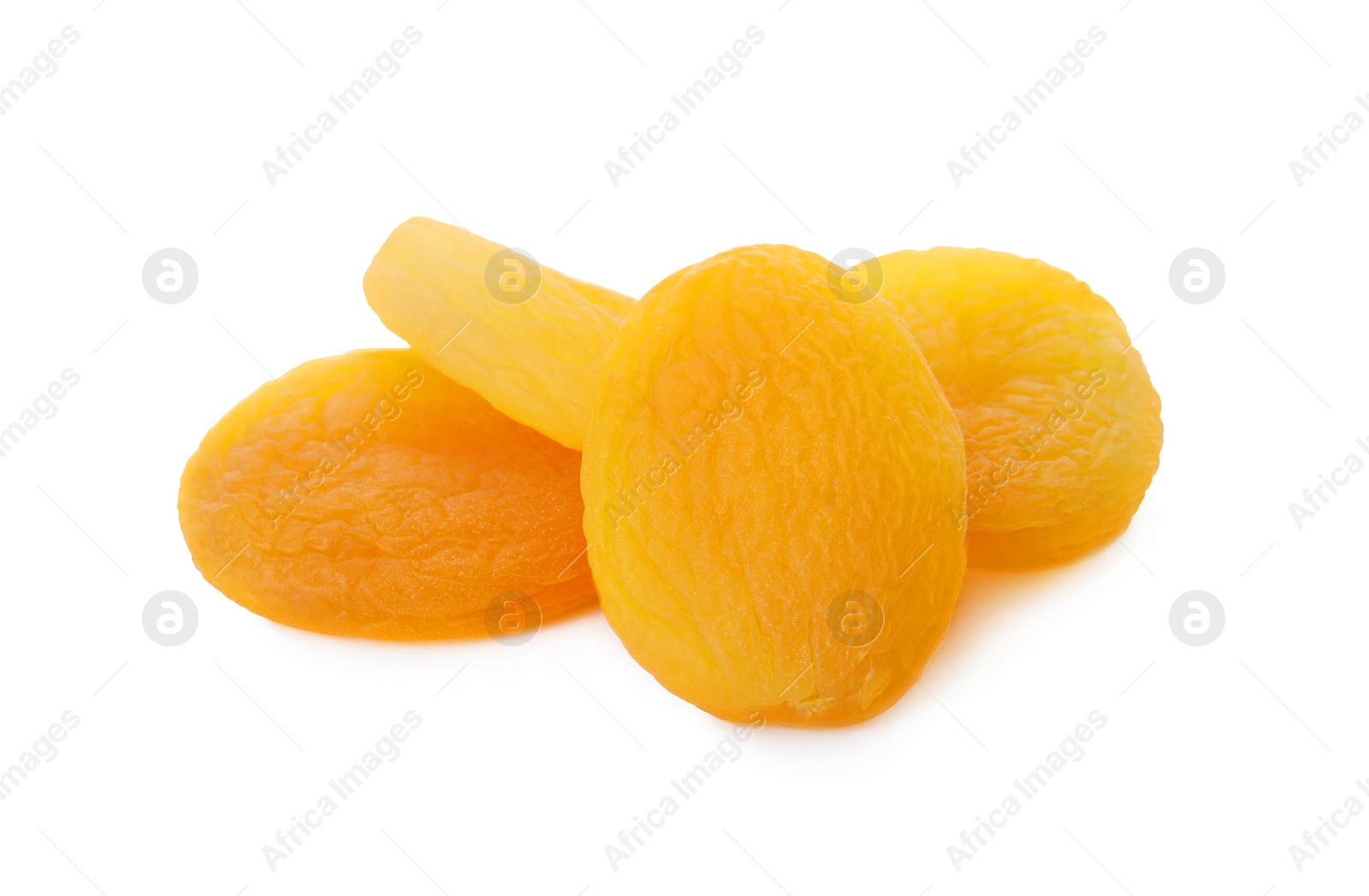 Photo of Pile of tasty apricots on white background. Dried fruits