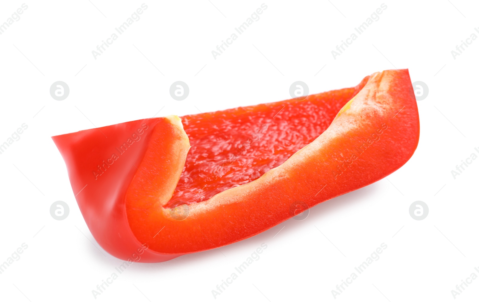Photo of Slice of red bell pepper isolated on white