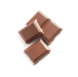 Photo of Pieces of tasty milk chocolate on white background, top view