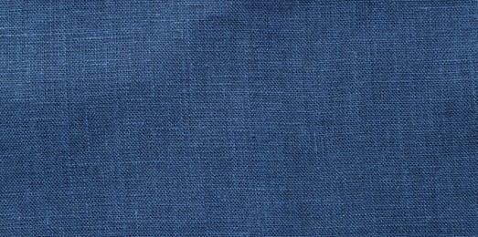 Texture of blue fabric as background, top view