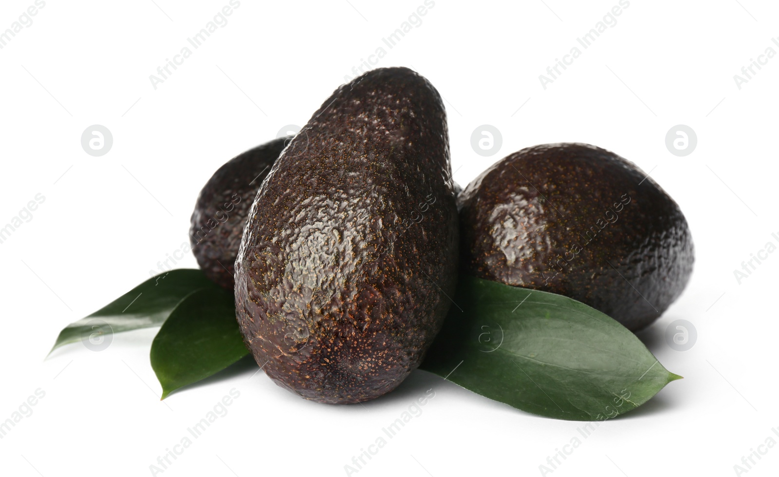 Photo of Delicious ripe hass avocadoes and green leaves on white background