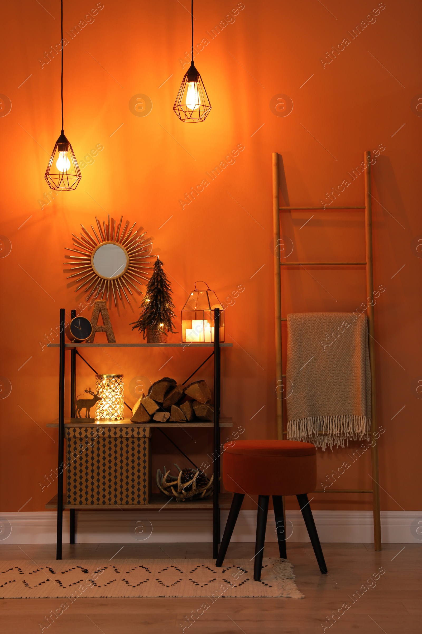 Photo of Beautiful room interior with Christmas decor on shelving unit