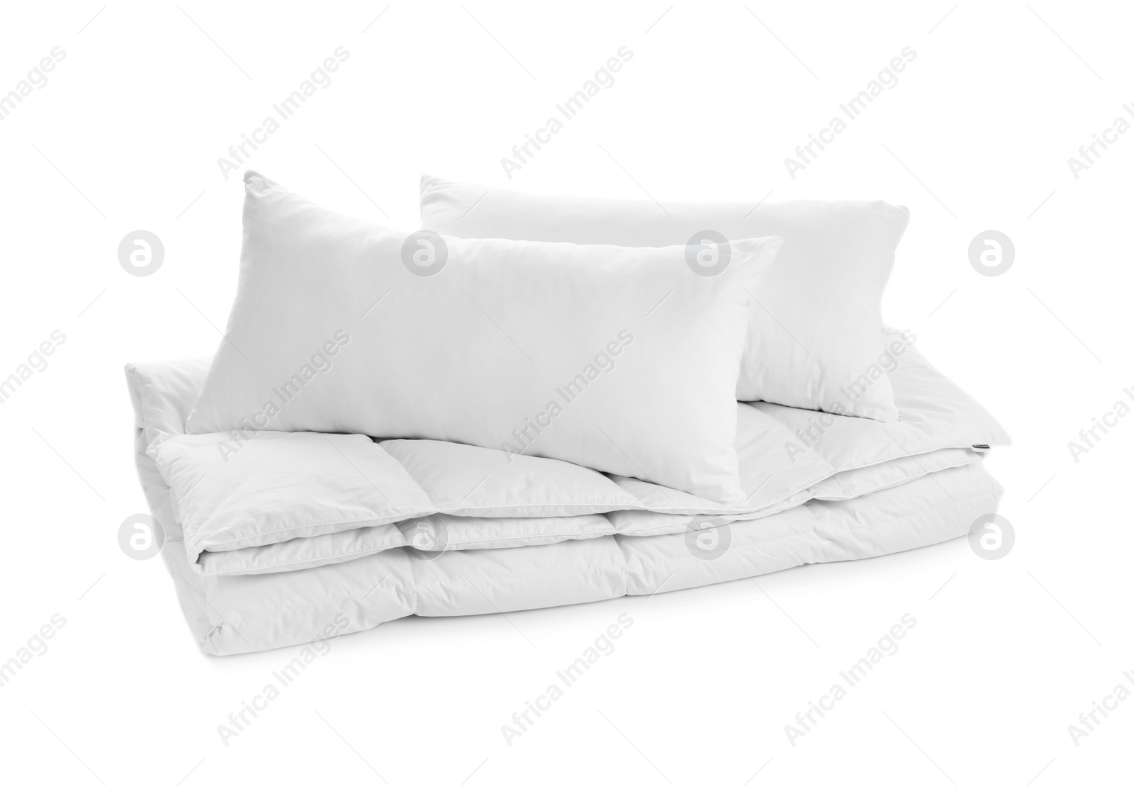 Photo of Soft blanket and pillows on white background