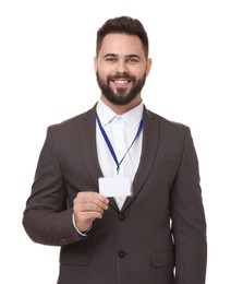 Happy young man with blank badge isolated on white