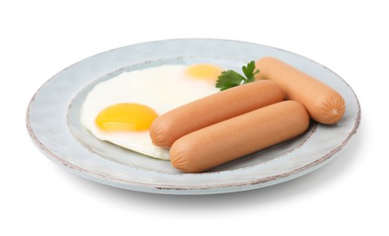 Photo of Delicious boiled sausages, fried eggs and parsley isolated on white