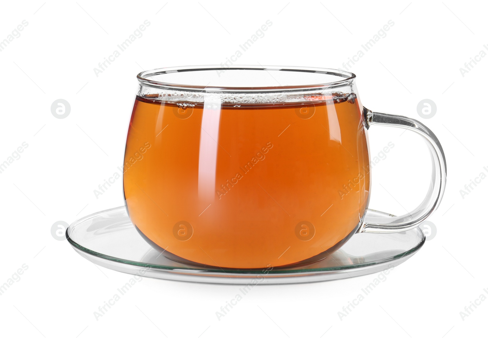 Photo of Aromatic tea in glass cup isolated on white